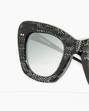 Cat-eye caged